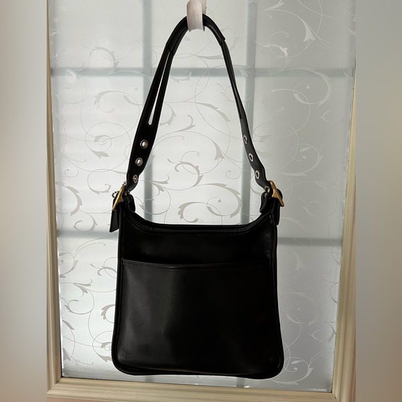 Coach Handbags - Vintage Coach Legacy zip bag in black leather, gold antique tone hardware, feet.